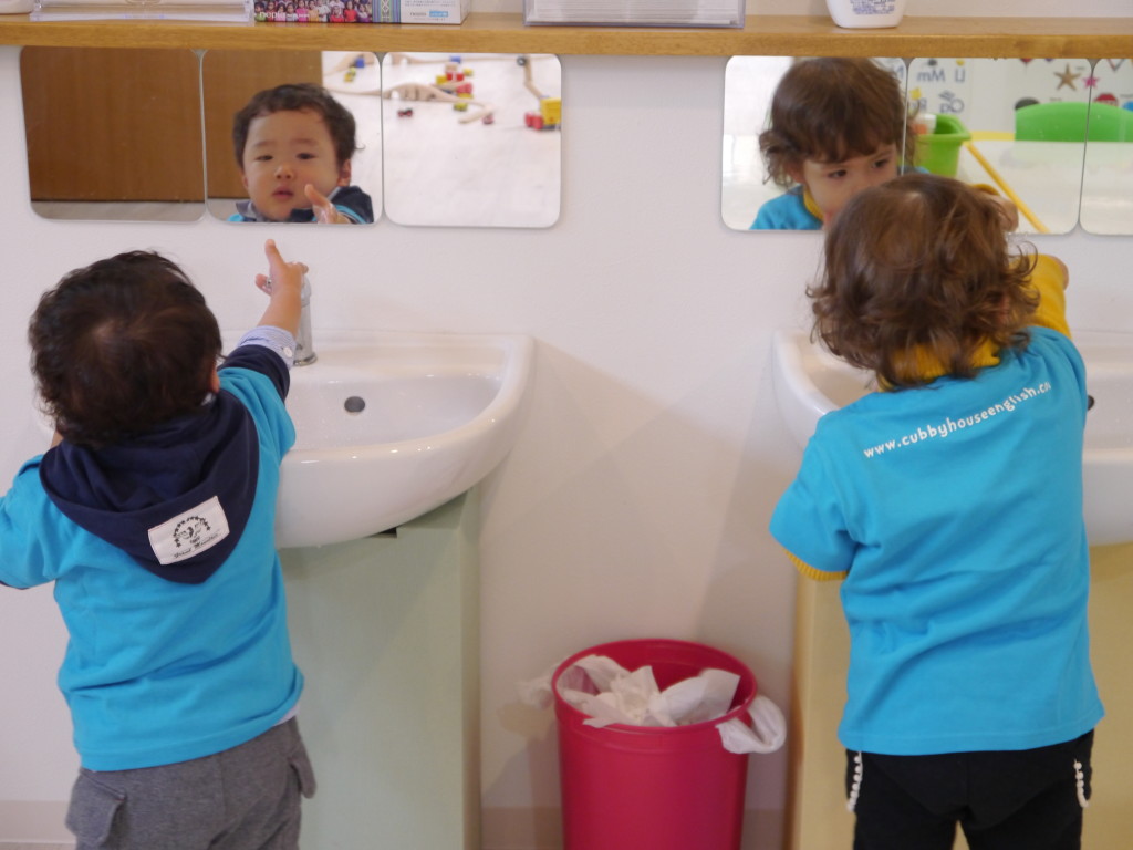 I see you Mommy..... LOOK! I'm washing my hands.